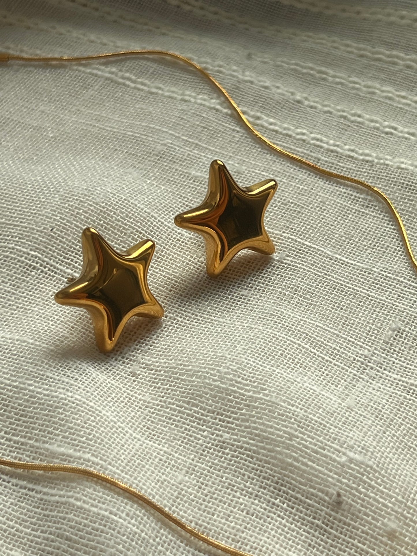 Golden star earrings