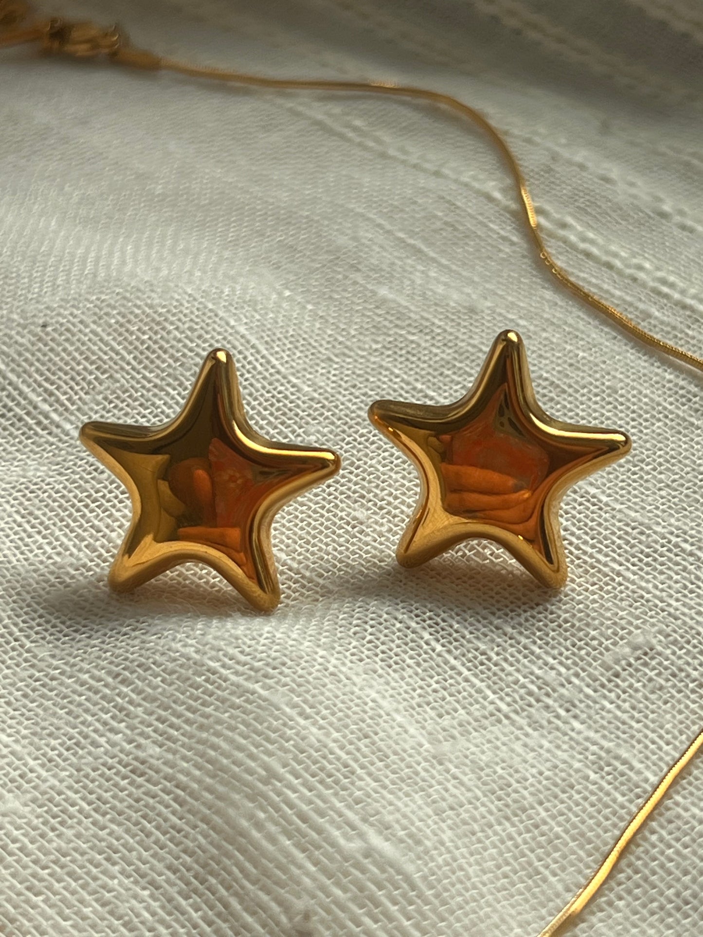 Golden star earrings
