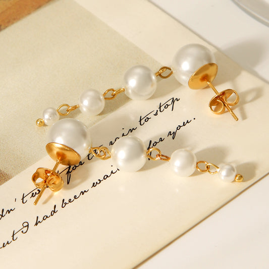 Golden pearl earrings